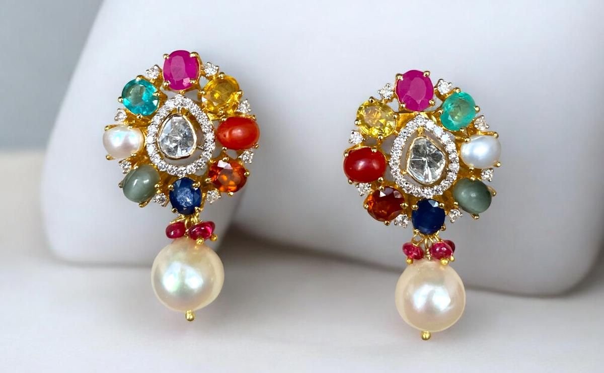 navratan earrings in 18k gold with diamond polki and south sea pearls by taparia jewels