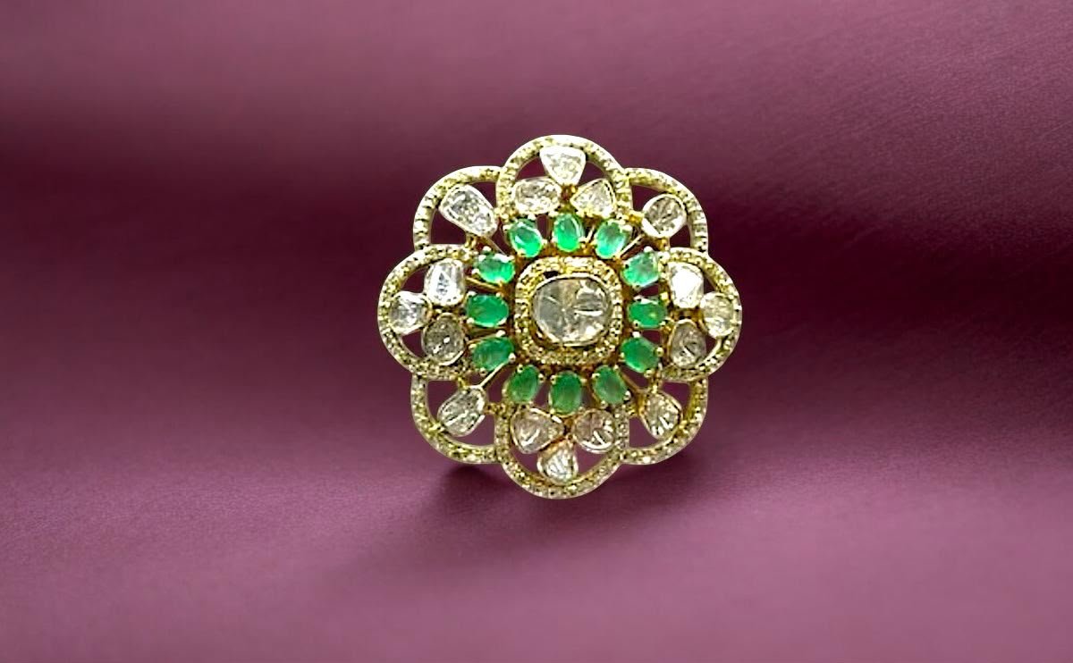 Jewellery for gown: Open Setting Emerald detail on a fusion reception look